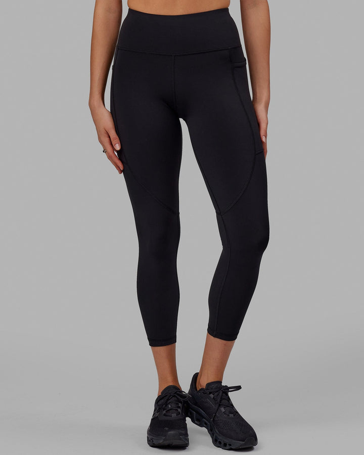 Woman wearing Rep 7/8 Length Tight - Black-Apple Mint