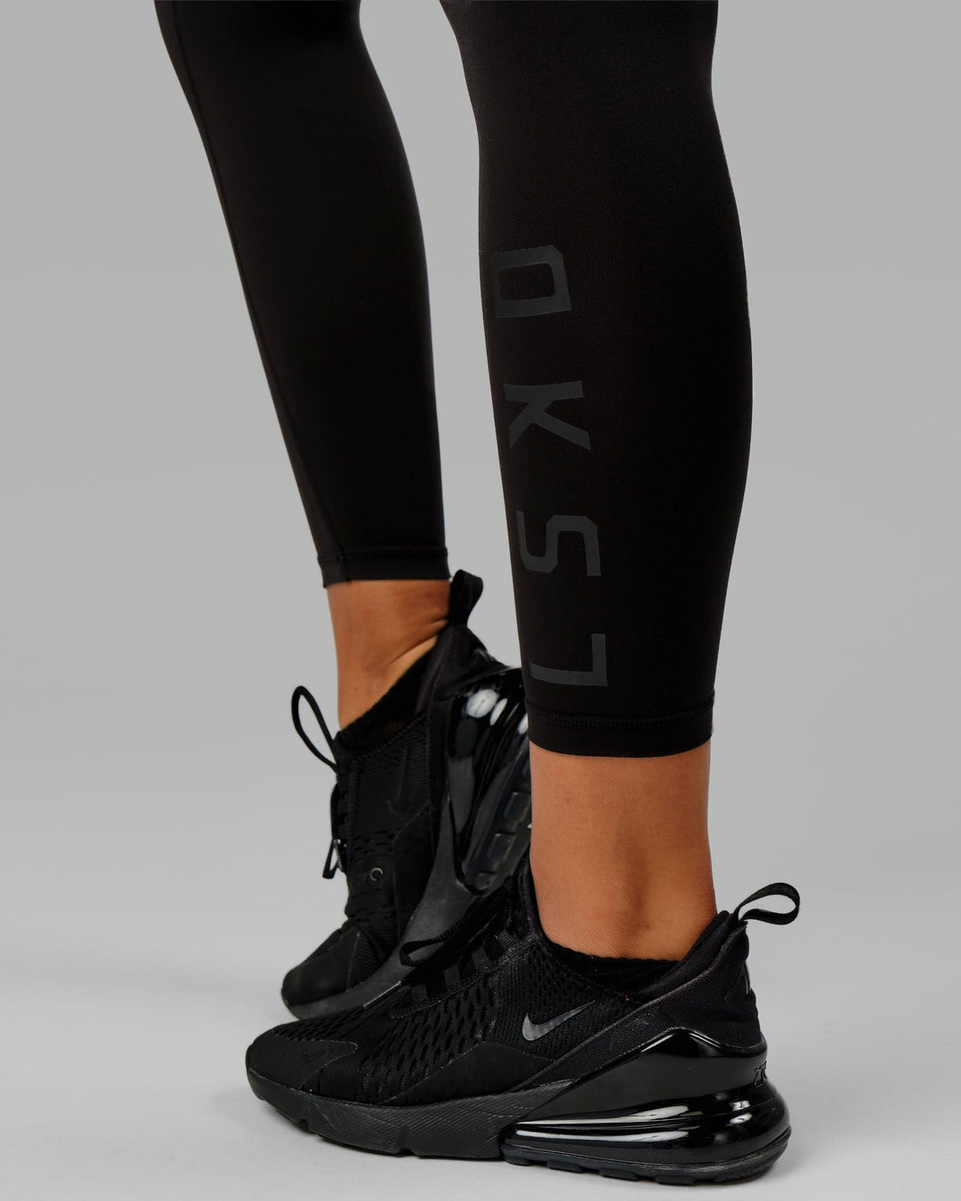 Woman wearing Rep Ultra High-Rise 7/8 Legging Pockets - Black-Black | Model:Isabella | Size:S