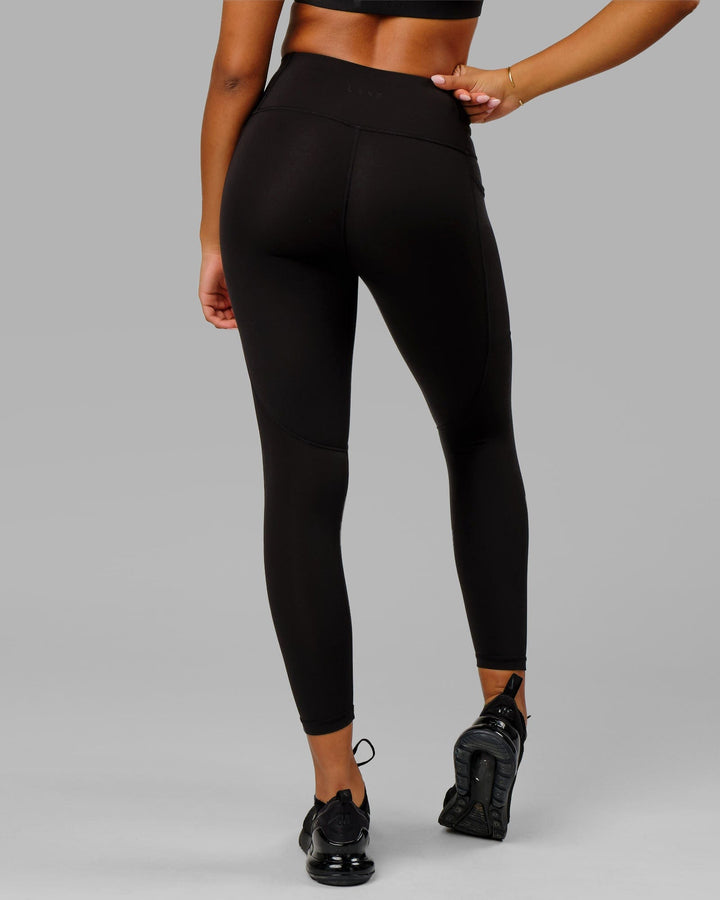 Woman wearing Rep 7/8 Length Tight - Black-Black