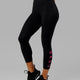 Woman wearing Rep 7/8 Length Tight - Black-Boysenberry