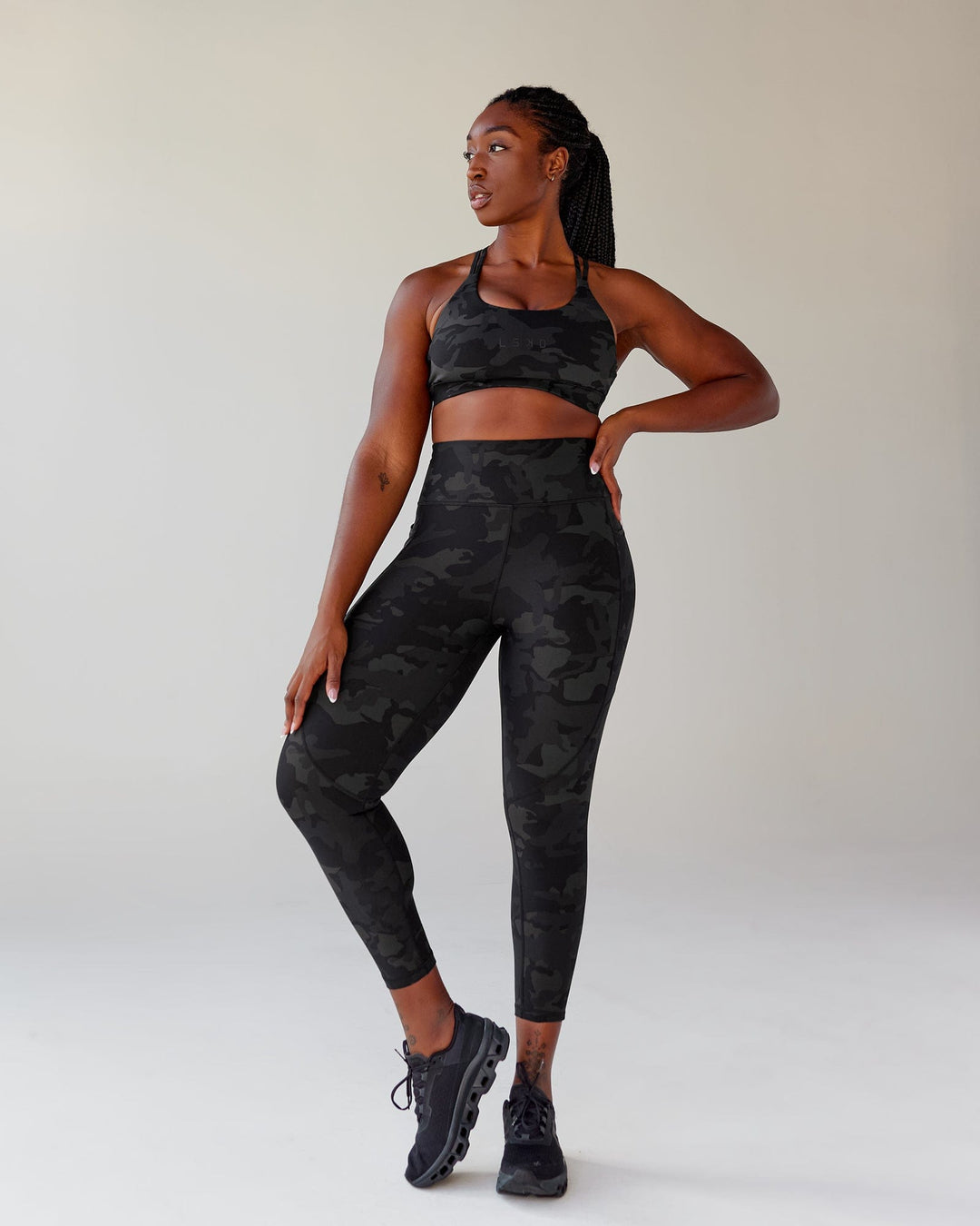 Woman wearing Rep Ultra High-Rise 7/8 Legging Pockets - Black Camo | Model:Krystal | Size:L