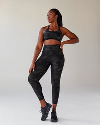 Woman wearing Rep Ultra High-Rise 7/8 Legging Pockets - Black Camo | Model:Krystal | Size:L
