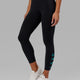 Woman wearing Rep 7/8 Length Tight - Black-Hyper Teal