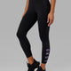 Woman wearing Rep 7/8 Length Tight - Black-Lilac
