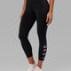 Woman wearing Rep 7/8 Length Tight - Black-Pink Frosting