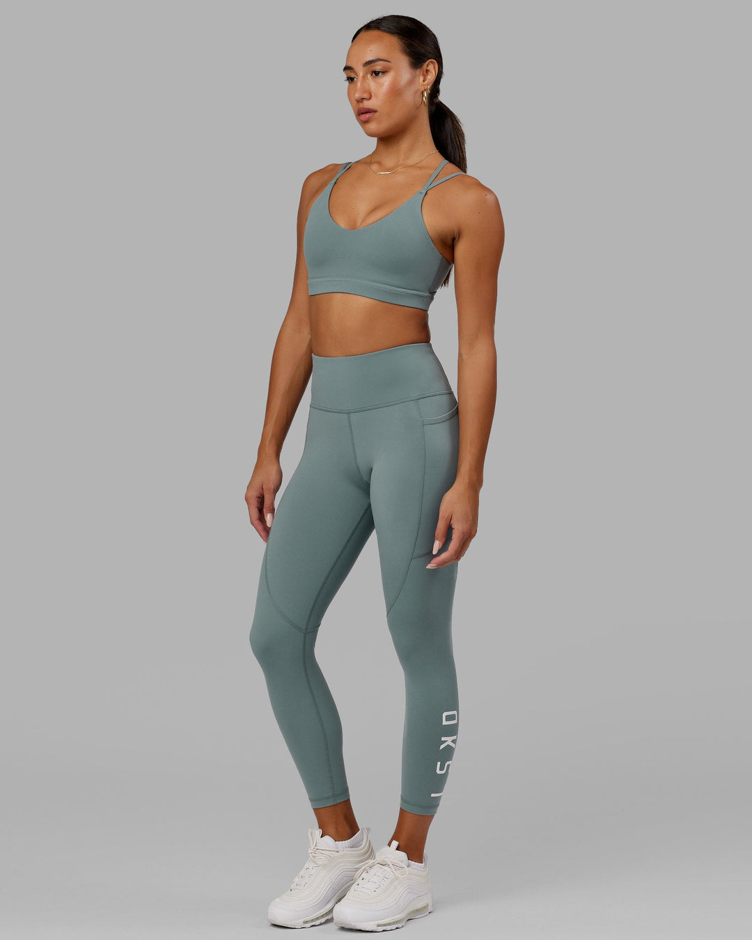 Woman wearing Rep 7/8 Length Tight - Eclipse