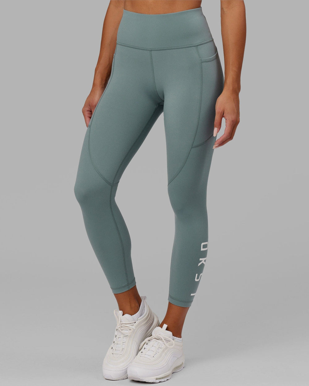 Woman wearing Rep 7/8 Length Tight - Eclipse