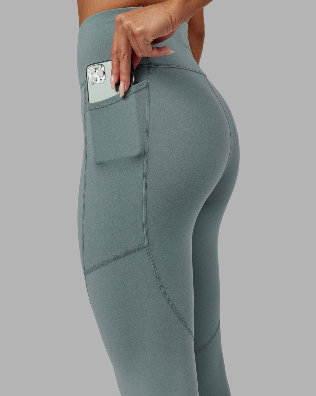 Woman wearing Rep 7/8 Length Tight - Eclipse