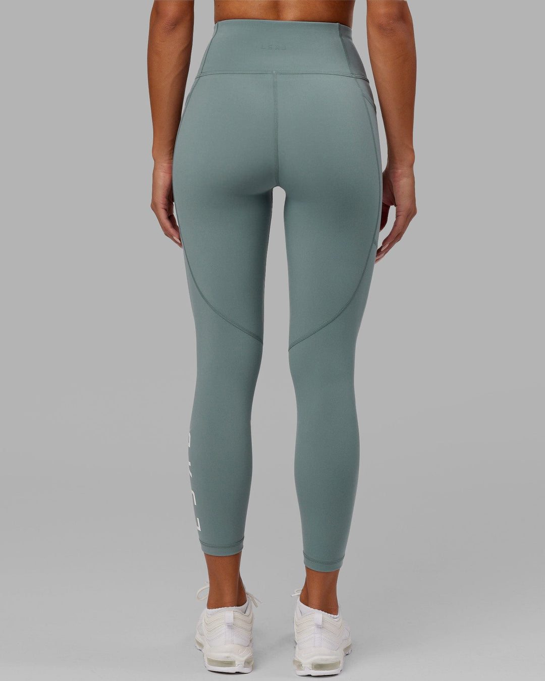 Woman wearing Rep 7/8 Length Tight - Eclipse