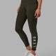 Woman wearing Rep 7/8 Length Tight - Forest Night