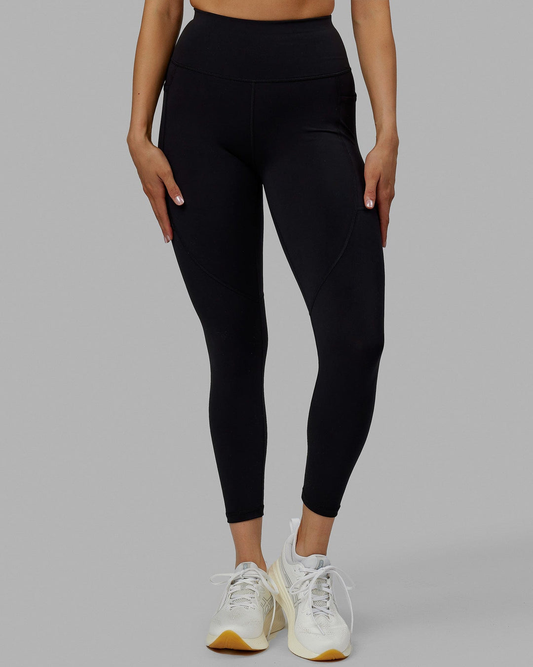 Woman wearing Rep Ultra High-Rise 7/8 Legging Pockets No Logo - Black | Model:Blaize | Size:S