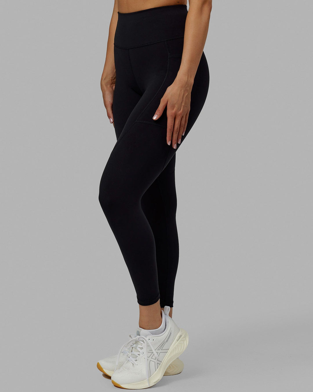 Woman wearing Rep Ultra High-Rise 7/8 Legging Pockets No Logo - Black | Model:Blaize | Size:S