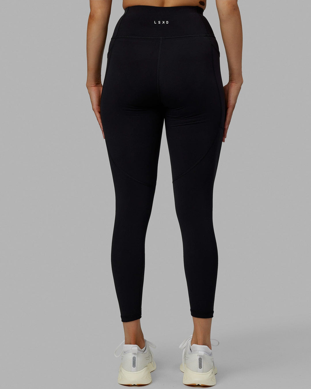 Woman wearing Rep Ultra High-Rise 7/8 Legging Pockets No Logo - Black | Model:Blaize | Size:S