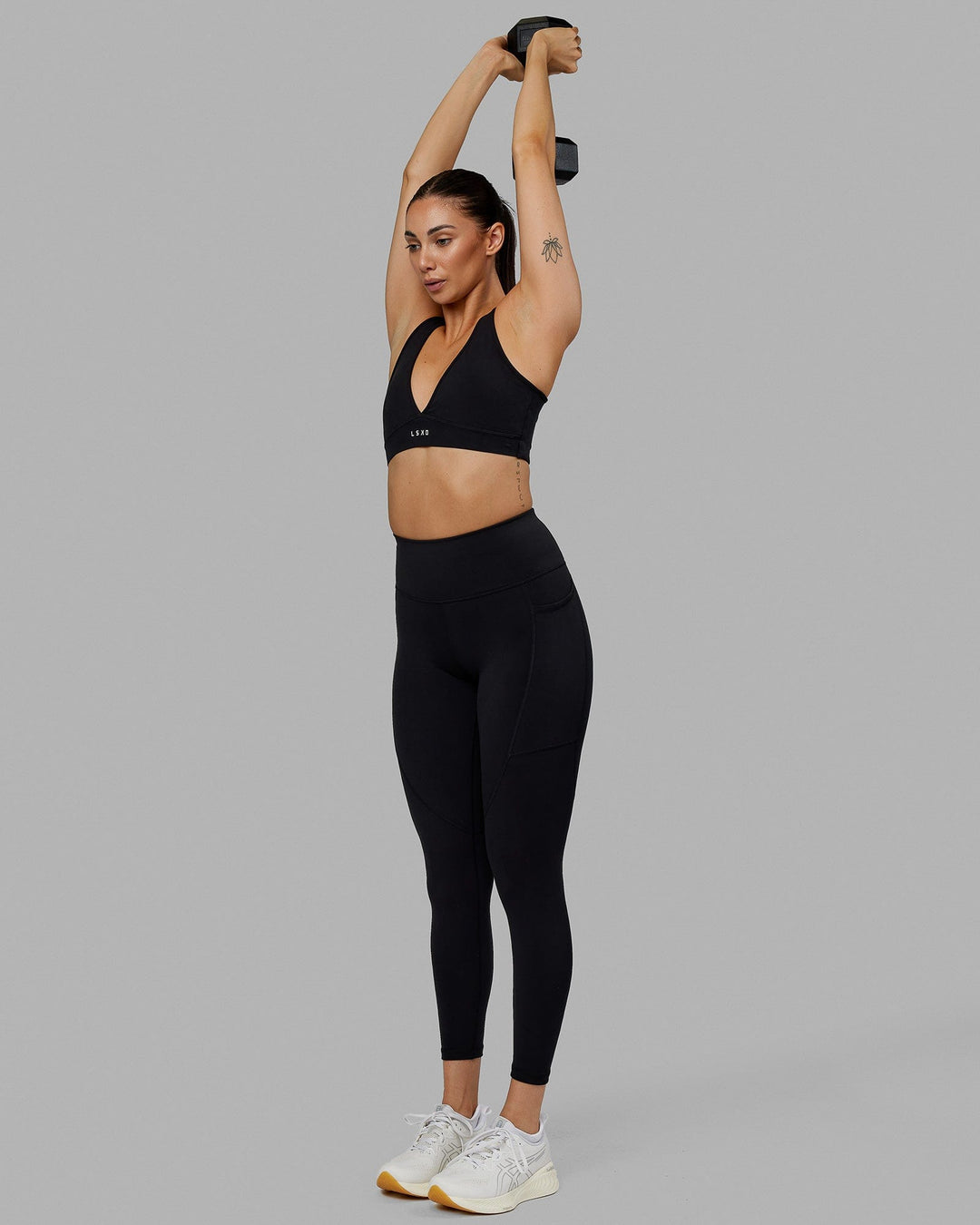 Woman wearing Rep Ultra High-Rise 7/8 Legging Pockets No Logo - Black | Model:Blaize | Size:S