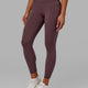 Woman wearing Rep 7/8 Length Tight - Plum