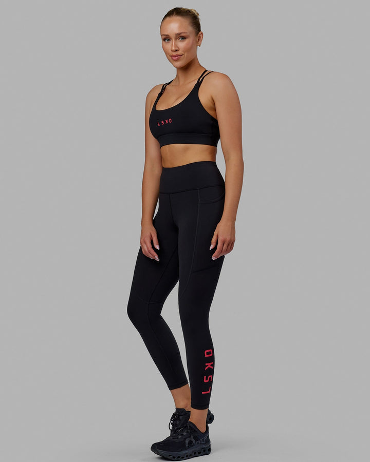 Woman wearing Rep 7/8 Length Tights - Black-Raspberry