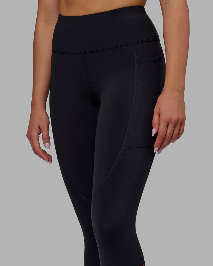 Woman wearing Rep 7/8 Length Tights - Black-Raspberry