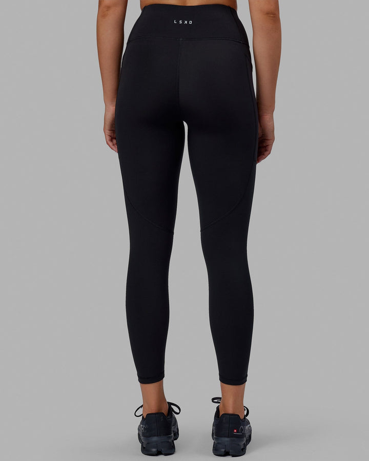 Woman wearing Rep 7/8 Length Tights - Black-Raspberry
