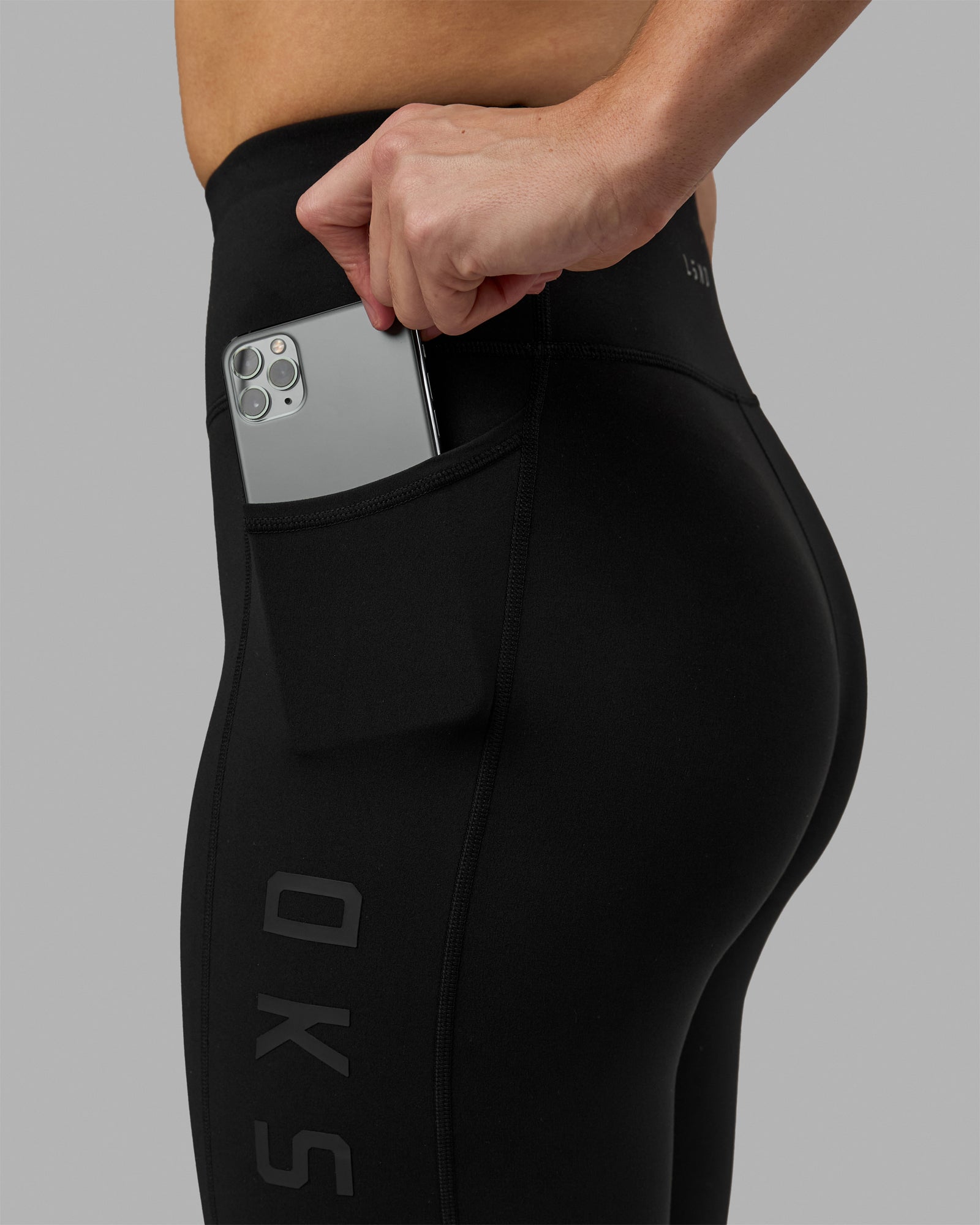 Woman wearing Rep Ultra High-Rise 9" Short Pockets - Black-Black | Model:Hannah | Size:S