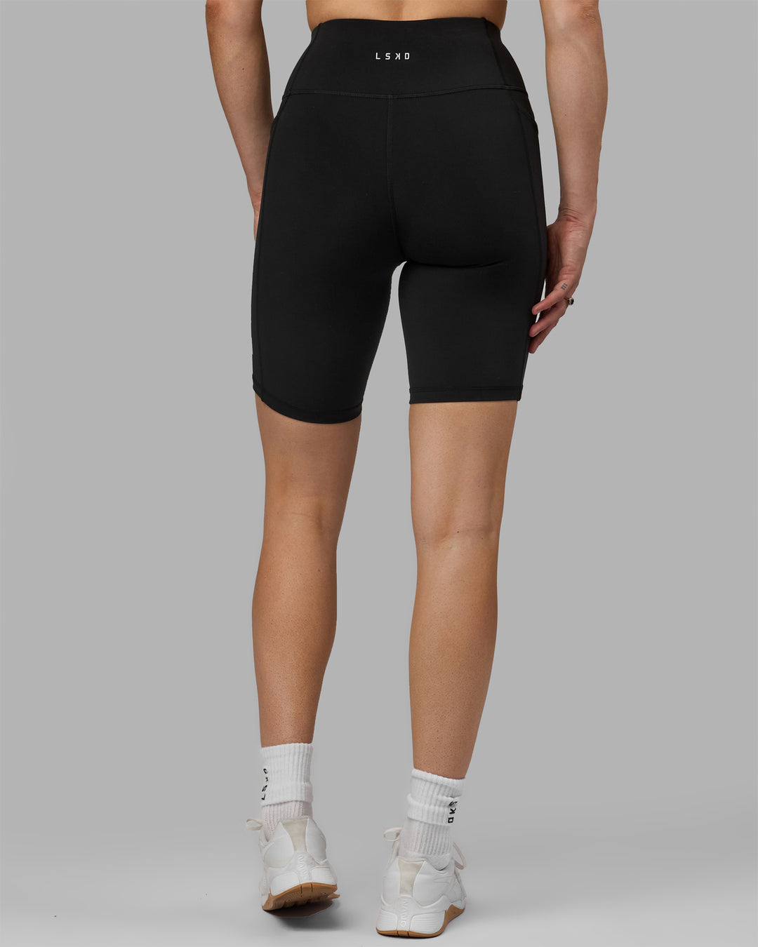 Woman wearing Rep Ultra High-Rise 9&quot; Short Pockets - Black-White | Model:Hannah | Size:S