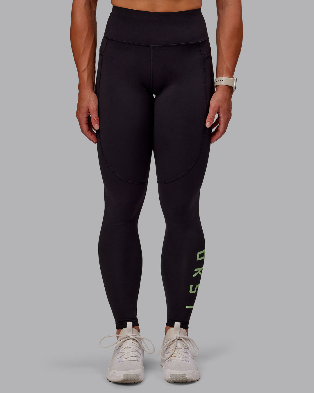 Woman wearing Rep Ultra High-Rise Full Length Legging Pockets - Black-Surreal Green | Model:Amber | Size:S