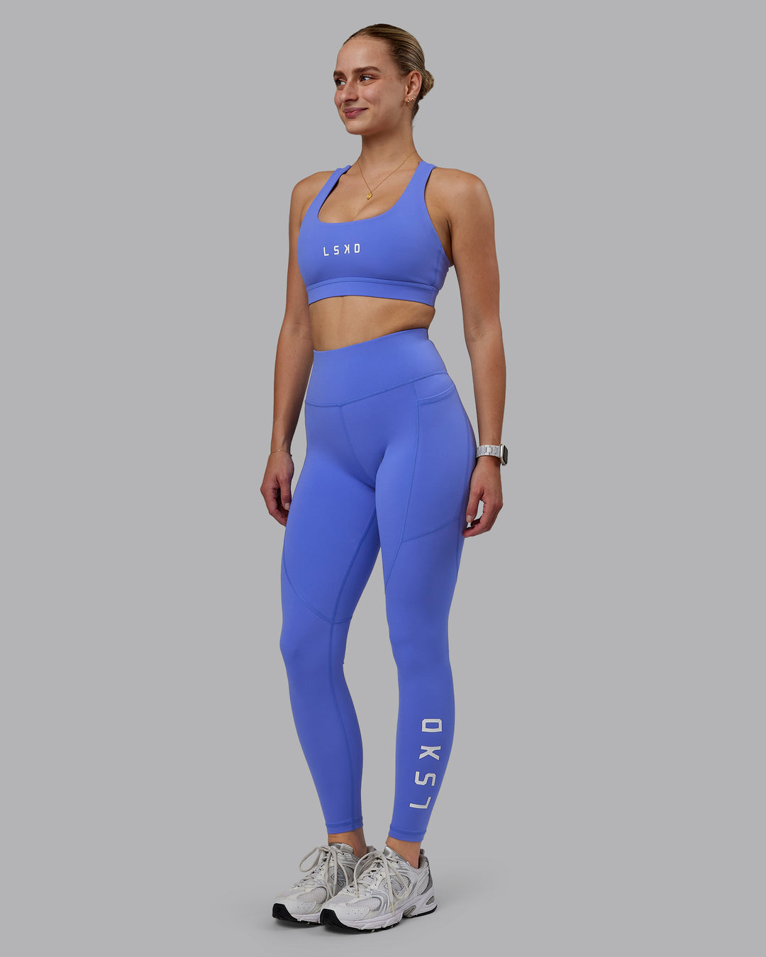 Woman wearing Rep Ultra High-Rise Full Length Legging Pockets - Baja Blue-White | Model:Lillie | Size:S