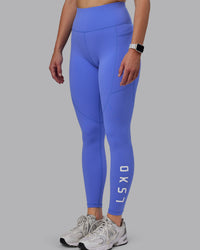 Woman wearing Rep Ultra High-Rise Full Length Legging Pockets - Baja Blue-White | Model:Lillie | Size:S