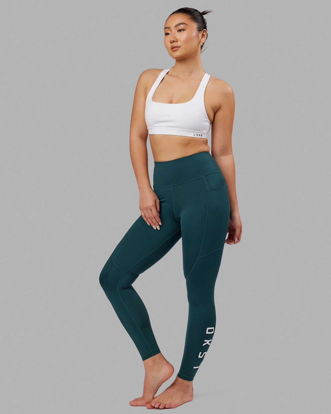 Woman wearing Rep Full Length Tight - Deep Teal