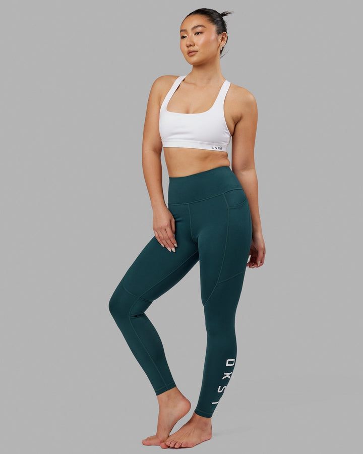 Woman wearing Rep Full Length Tight - Deep Teal