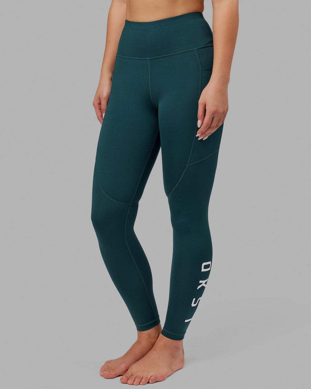 Woman wearing Rep Full Length Tight - Deep Teal
