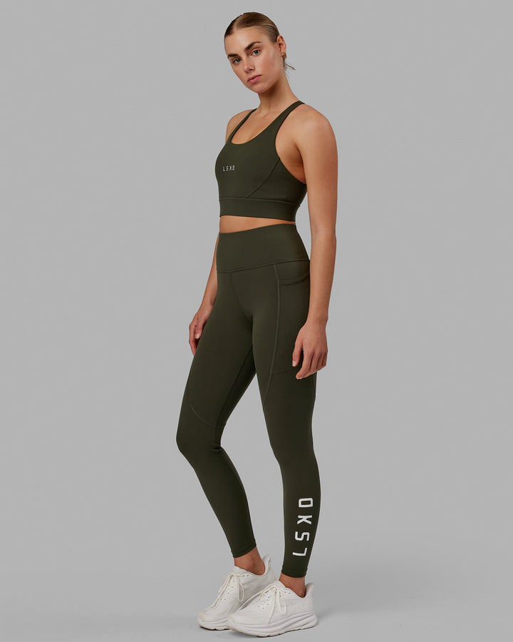 Woman wearing Rep Full Length Tight - Forest Night