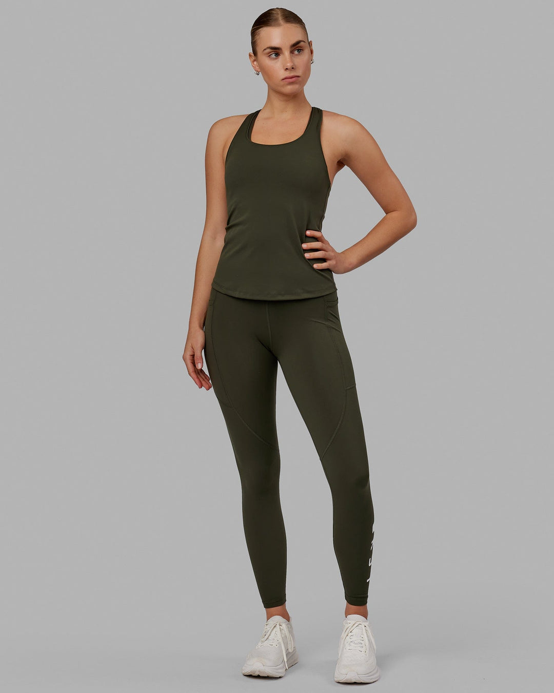 Woman wearing Rep Ultra High-Rise Full Length Legging Pockets - Forest Night | Model:Bodhi | Size:S