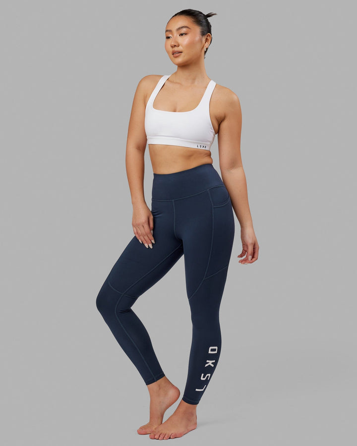 Woman wearing Rep Full Length Tight - Navy