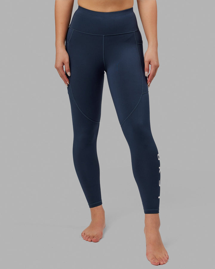 Woman wearing Rep Full Length Tight - Navy