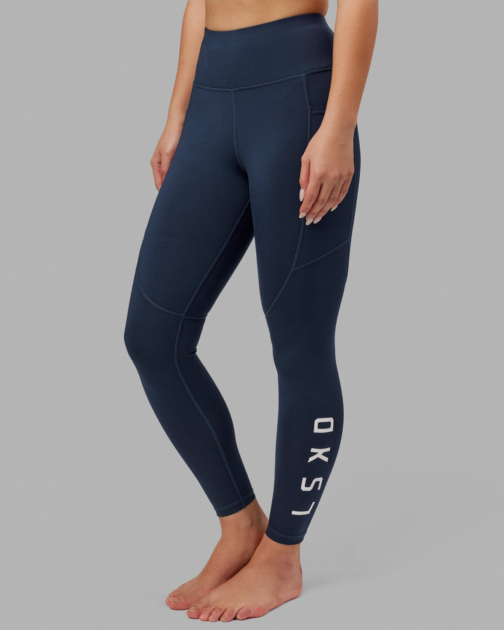 Woman wearing Rep Full Length Tight - Navy