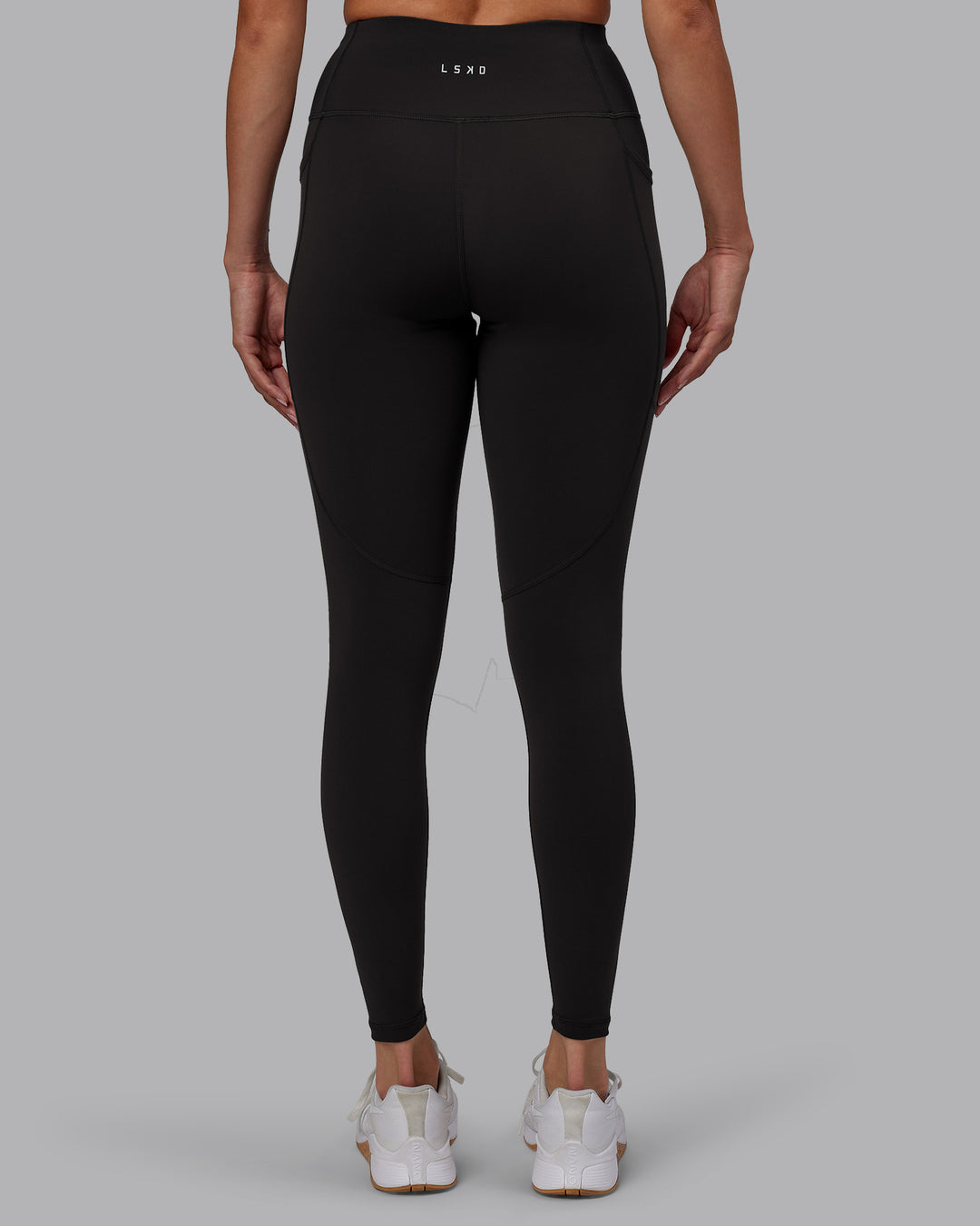 Woman wearing Rep Ultra High-Rise Full Length Legging Pockets - Pirate Black-White | Model:Blaize | Size:S