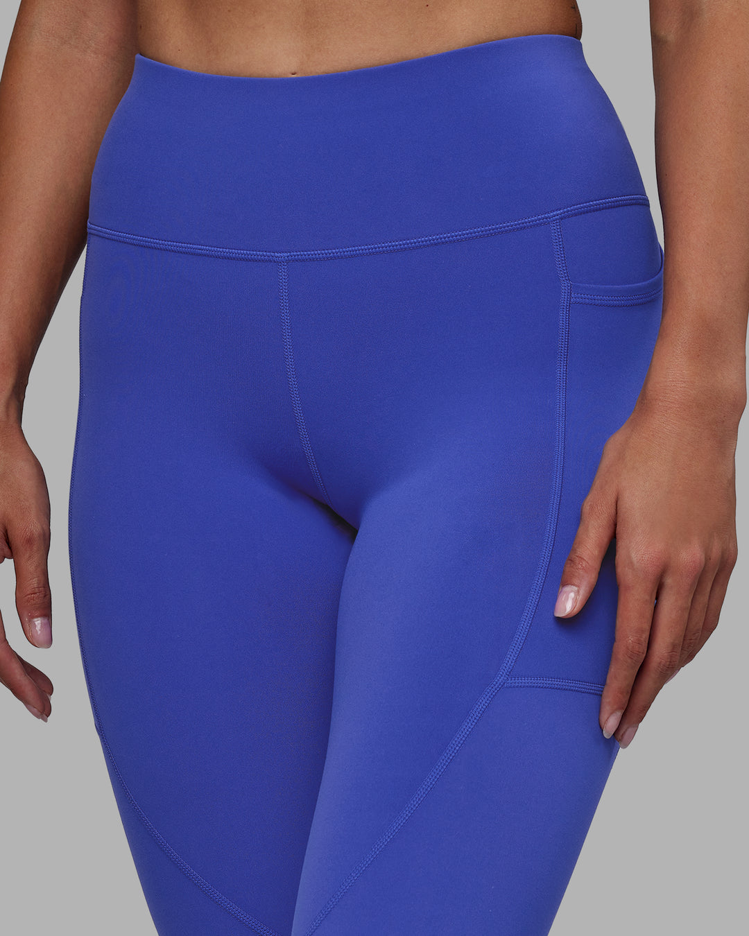 Woman wearing Rep Ultra High-Rise Full Length Legging Pockets - Power Cobalt-White | Model:Blaize | Size:S