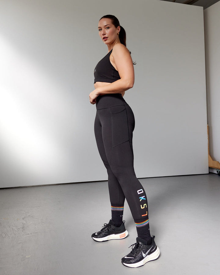 Woman wearing Rep Full Length Tight - Pride-Black