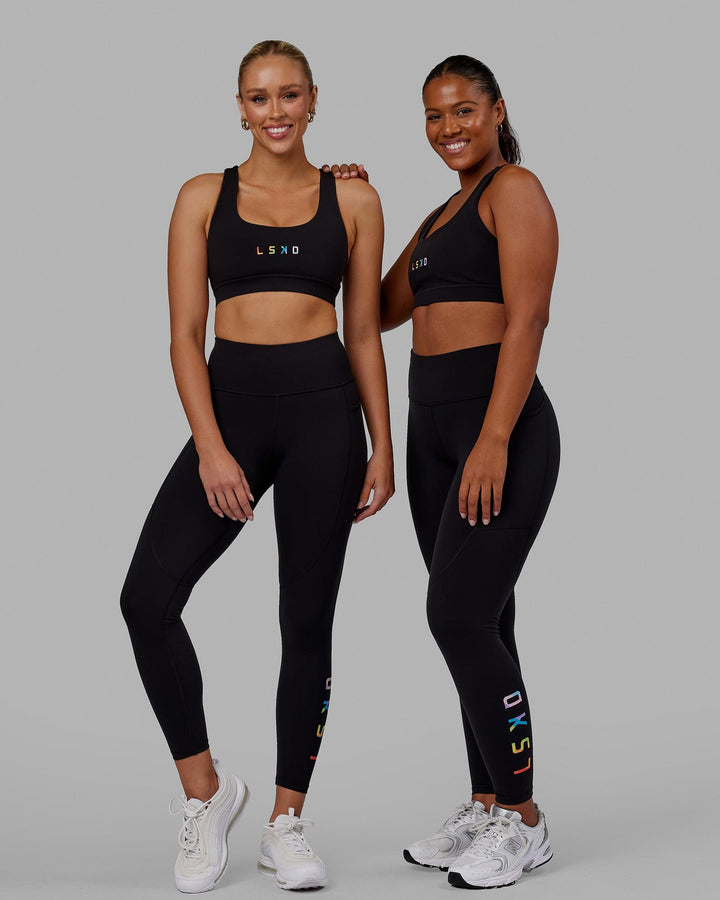 Woman wearing Rep Full Length Tight - Pride-Black