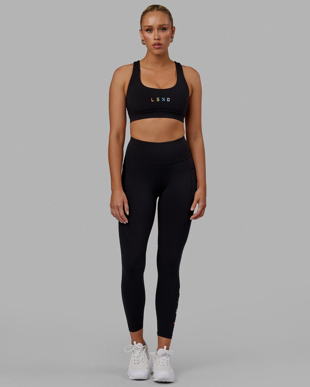 Woman wearing Rep Full Length Tight - Pride-Black