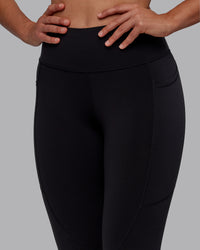 Woman wearing Rep Ultra High-Rise Full Length Legging Pockets - Black-Fuchsia Pink | Model:Sophie | Size:S