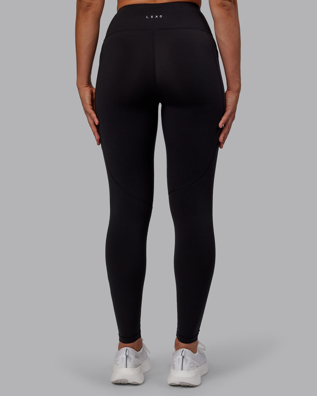 Woman wearing Rep Ultra High-Rise Full Length Legging Pockets - Black-Fuchsia Pink | Model:Sophie | Size:S