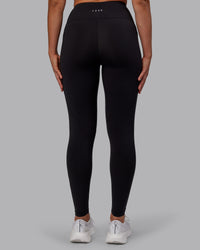 Woman wearing Rep Ultra High-Rise Full Length Legging Pockets - Black-Fuchsia Pink | Model:Sophie | Size:S