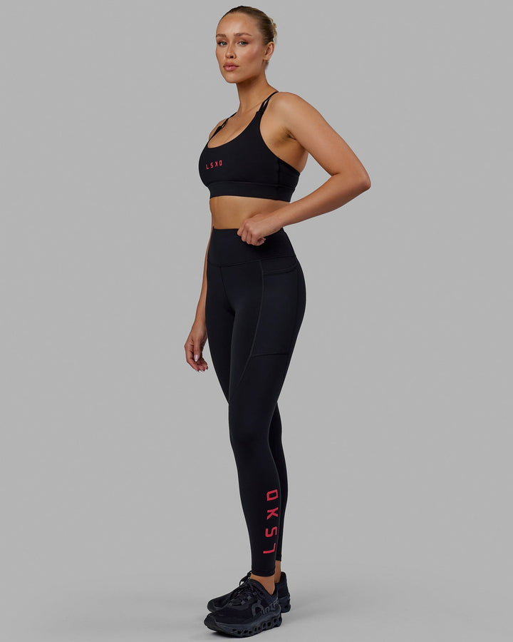 Woman wearing Rep Full Length Tights - Black-Raspberry