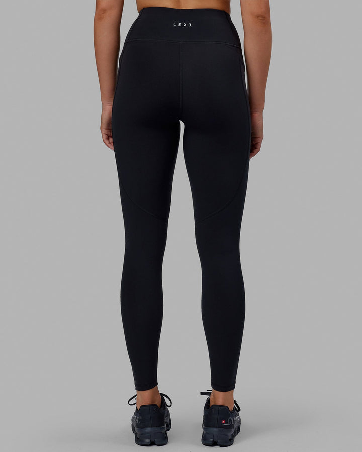 Woman wearing Rep Full Length Tights - Black-Raspberry