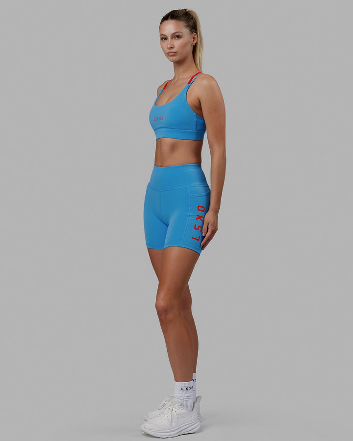 Woman wearing Rep Mid Short Tight - Azure Blue-Infrared