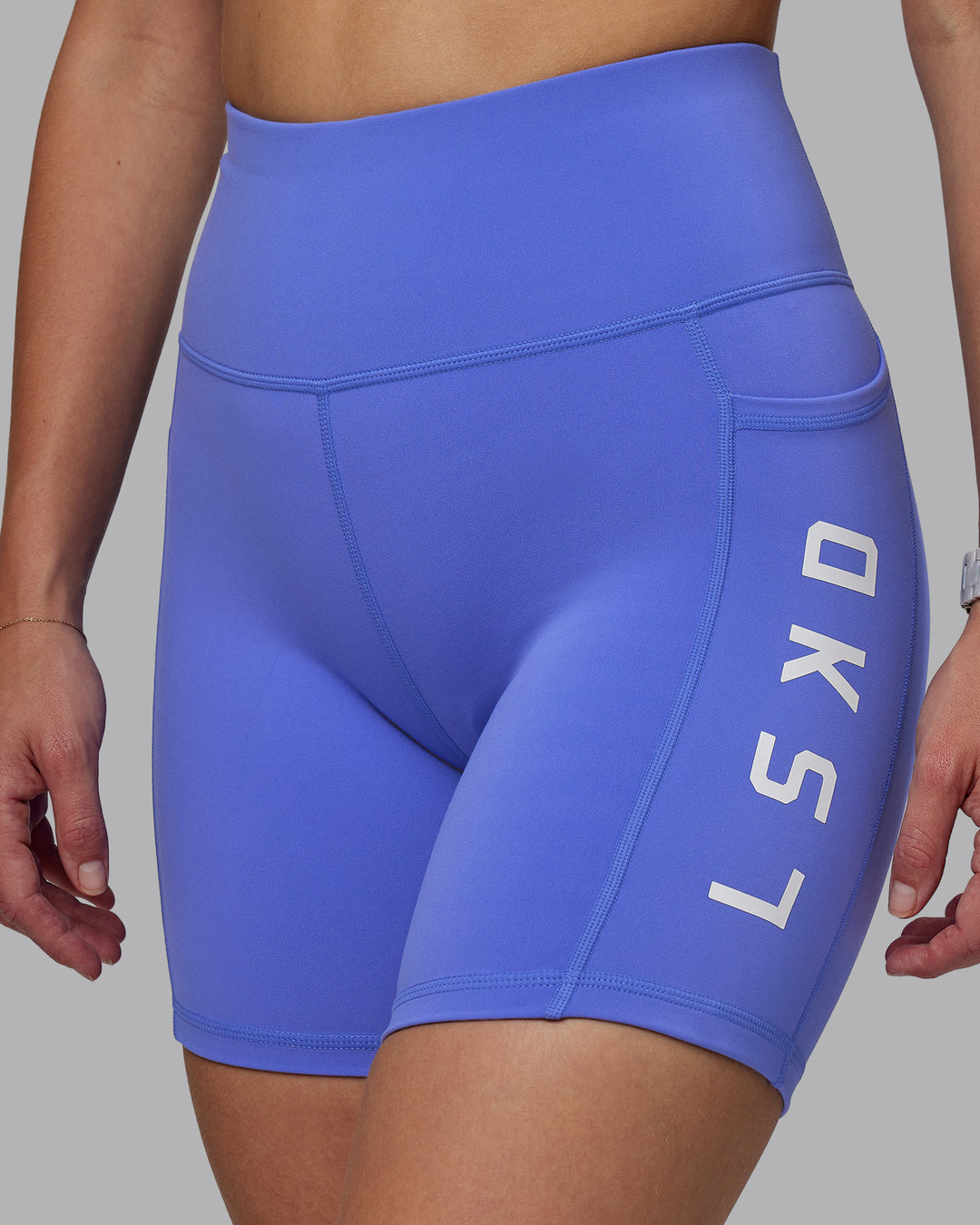 Woman wearing Rep Ultra High-Rise 6&quot; Short Pockets - Baja Blue-White | Model:Lillie | Size:S