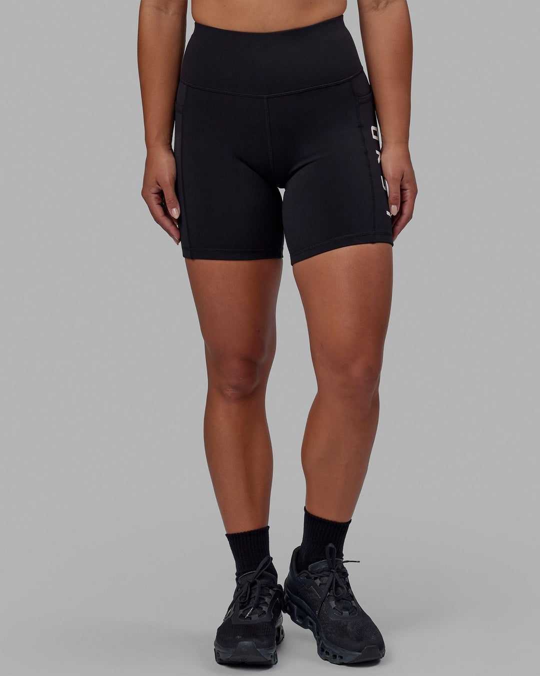 Woman wearing Rep Mid Short Tight - Black-White