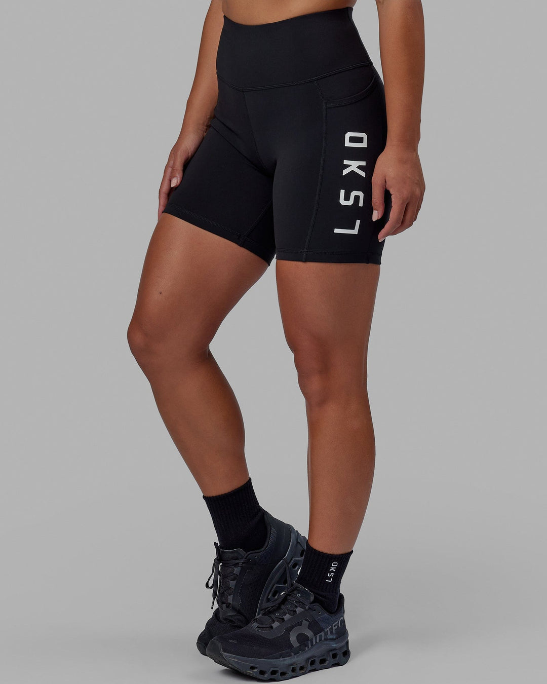 Woman wearing Rep Mid Short Tight - Black-White