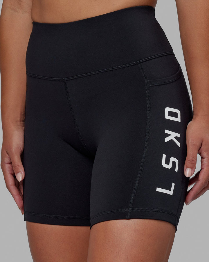Woman wearing Rep Mid Short Tight - Black-White
